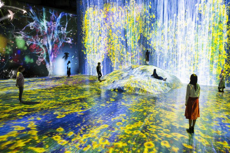 Still from teamLab work called Universe of Water Particles on a Rock Where People Gather